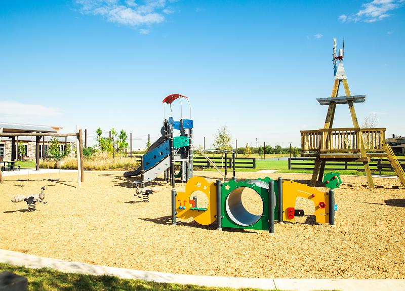 A community photo of a playground located in a Richmond, TX community.