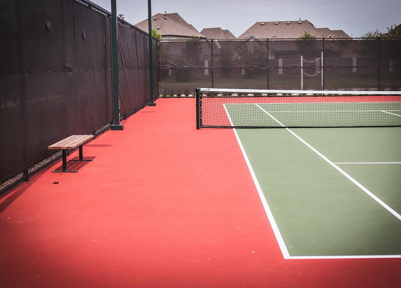 Harvest Yard features tennis courts, reservable exclusively for residents of Harvest Green.