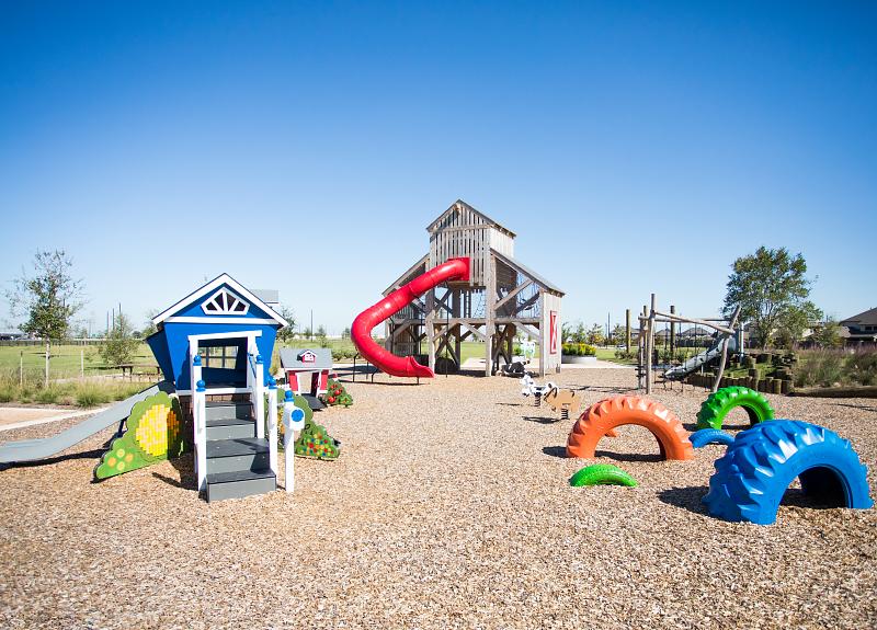 A community photo of one of the three playgrounds in Harvest Green.