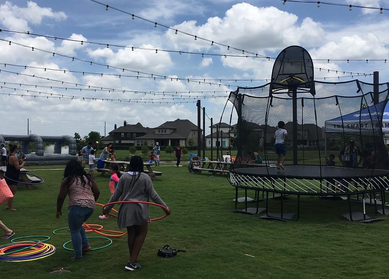 Harvest Green resident event had hula hoops, trampoline, outdoor games and more.
