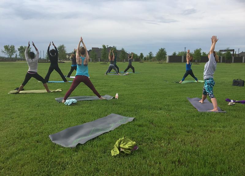 The onsite yoga classes are a popular event for Harvest Green residents.